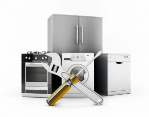 Commercial kitchen equipment Refrigerator, electric oven, washing machine and dishwasher with screwdriver and wrench standing on white reflective surface.